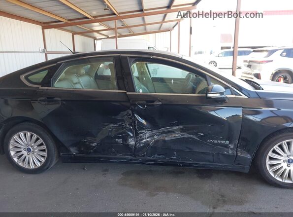 3FA6P0LU8GR187699 2016 FORD FUSION HYBRID Black Vista interior trasera