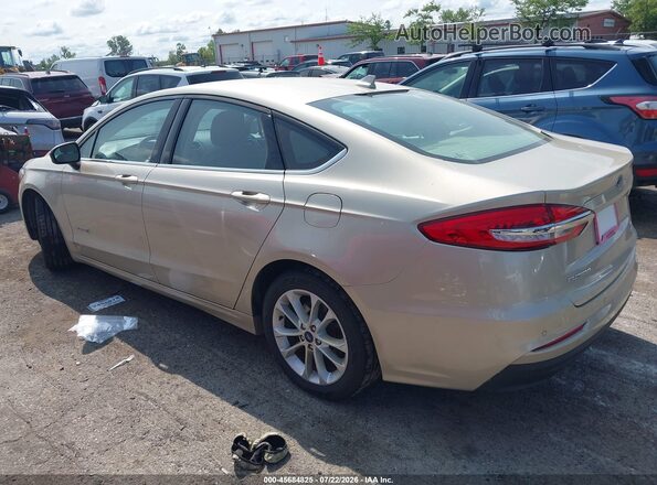 3FA6P0LU9KR129576 2019 FORD FUSION HYBRID Champagne Trasero izquierdo