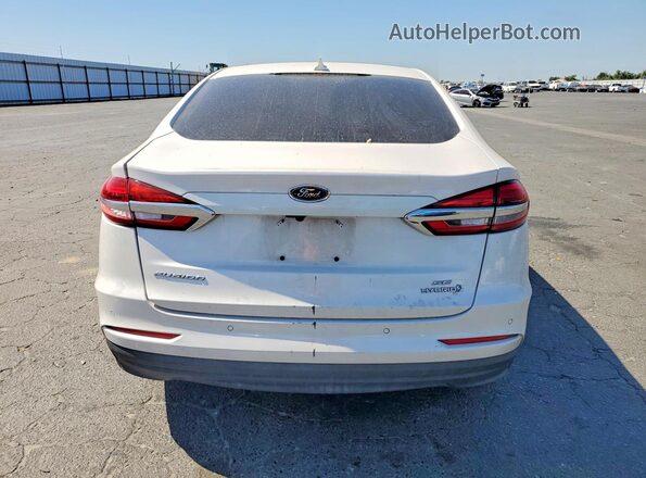3FA6P0LUXKR208982 2019 FORD FUSION White Vista trasera