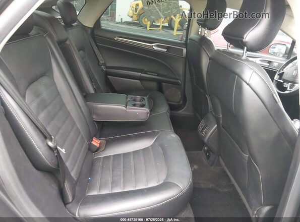 3FA6P0PU2HR329928 2017 FORD FUSION ENERGI Gray Vista de la etiqueta del VIN