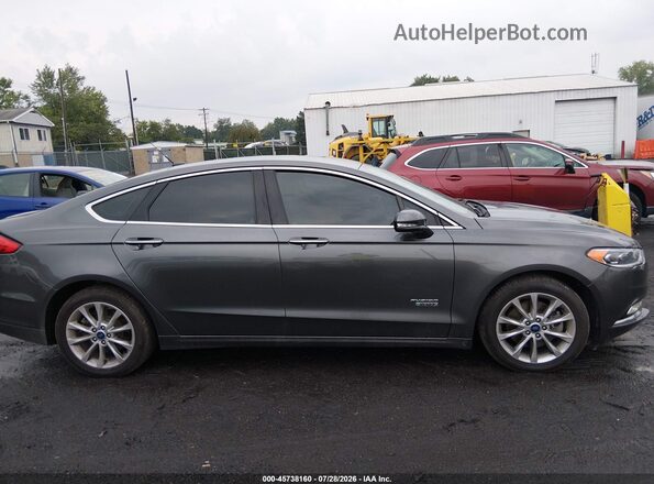 3FA6P0PU2HR329928 2017 FORD FUSION ENERGI Gray Vista interior trasera