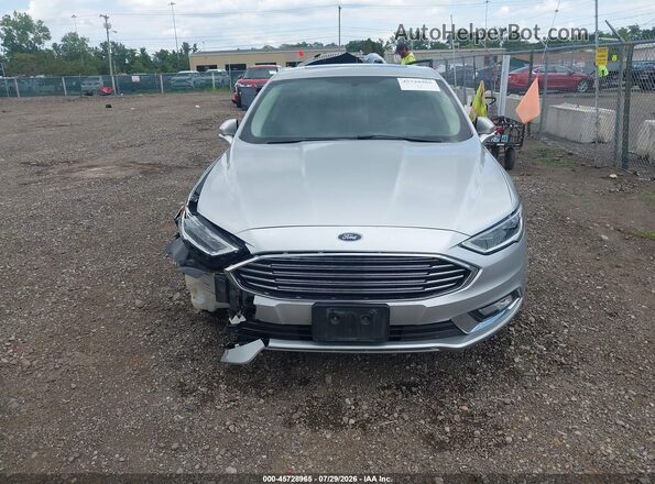 3FA6P0RU5HR128974 2017 FORD FUSION HYBRID Серебряный Вид задней части салона
