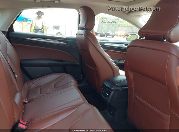 3FA6P0RUXGR131559 2016 FORD FUSION HYBRID Tan VIN կոդի պիտակի տեսք