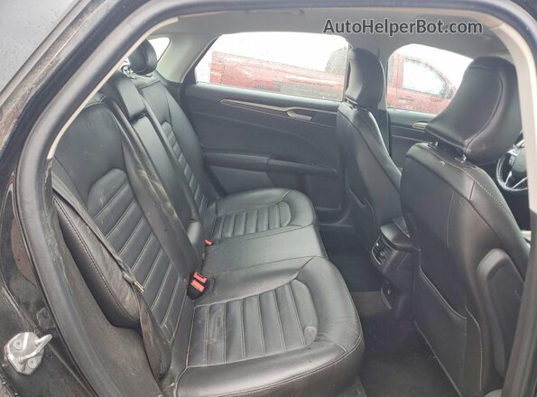 3FA6P0T95GR223649 2016 FORD FUSION Black Vista de los asientos traseros