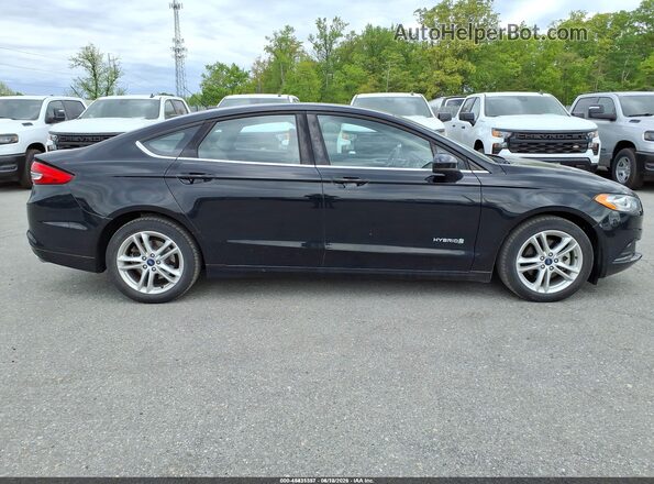 3FA6P0UU2JR101258 2018 FORD FUSION HYBRID Black Rear interior view
