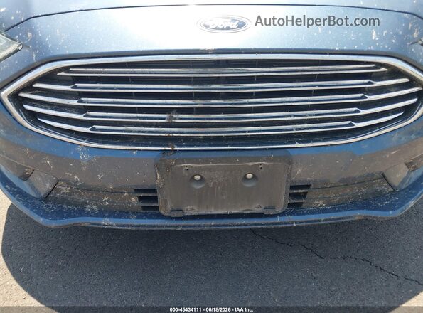3FA6P0UU2JR235770 2018 FORD FUSION HYBRID Blue Widok wnętrza z tyłu
