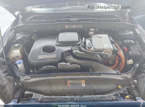 3FA6P0UU2JR281938 2018 FORD FUSION HYBRID Blue Rear view