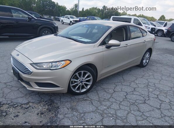 3FA6P0UU5HR360627 2017 FORD FUSION HYBRID Gold Առջևի ձախ երեք քառորդ տեսարան