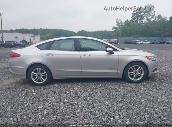 3FA6P0UUXJR254311 2018 FORD FUSION HYBRID Серебряный Вид задней части салона