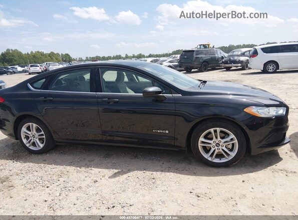 3FA6P0UUXJR271464 2018 FORD FUSION HYBRID Black Rear interior view