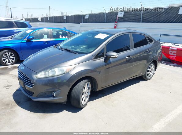 3FADP4BJ1GM105394 2016 FORD FIESTA Gray Vista tres cuartos delantera izquierda