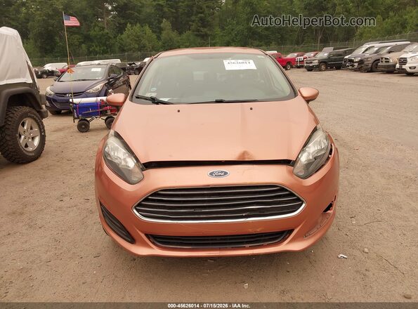 3FADP4BJ9HM118721 2017 FORD FIESTA Orange Front view
