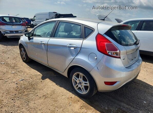 3FADP4EJ2JM122112 2018 FORD FIESTA Silver Tył lewy
