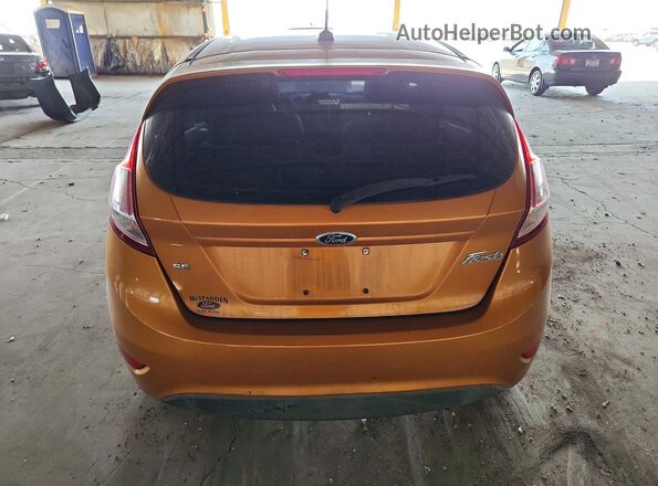 3FADP4EJ7GM139366 2016 FORD FIESTA Оранжевый Вид сзади