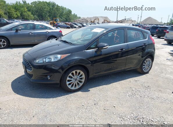 3FADP4FJ1JM144715 2018 FORD FIESTA Черный Передняя левая четверть