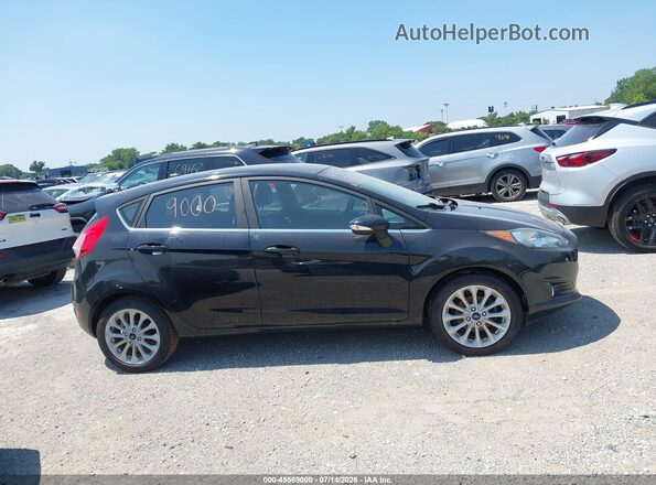 3FADP4FJ1JM144715 2018 FORD FIESTA Черный Вид задней части салона
