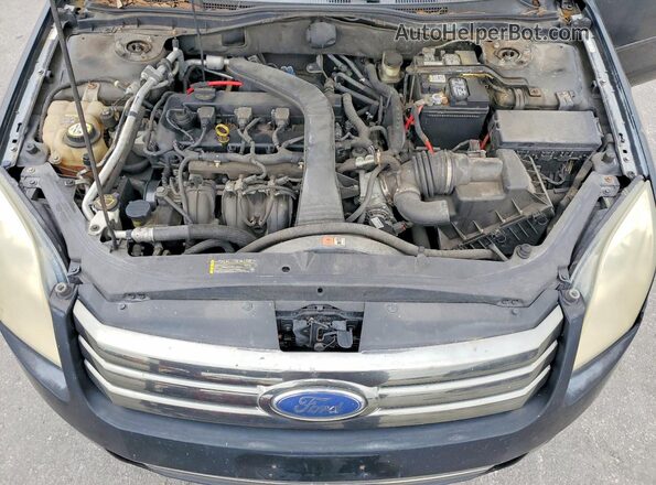 3FAHP07Z19R135526 2009 FORD ESCAPE Black Rear interior view
