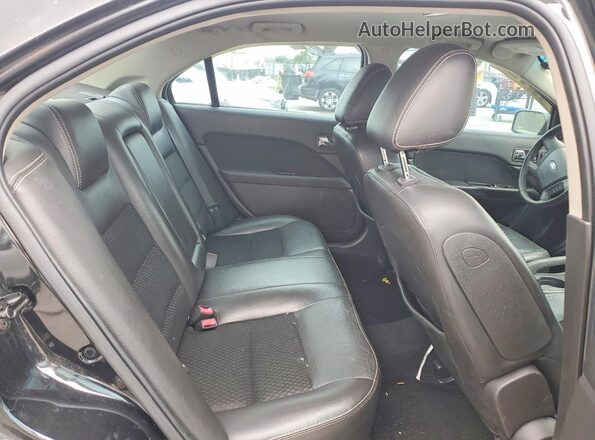 3FAHP07Z19R135526 2009 FORD ESCAPE Black Rear seats view