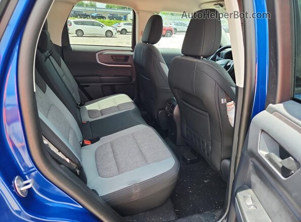 3FMCR9B65RRF71811 2024 FORD BRONCO Blue Vista interior trasera