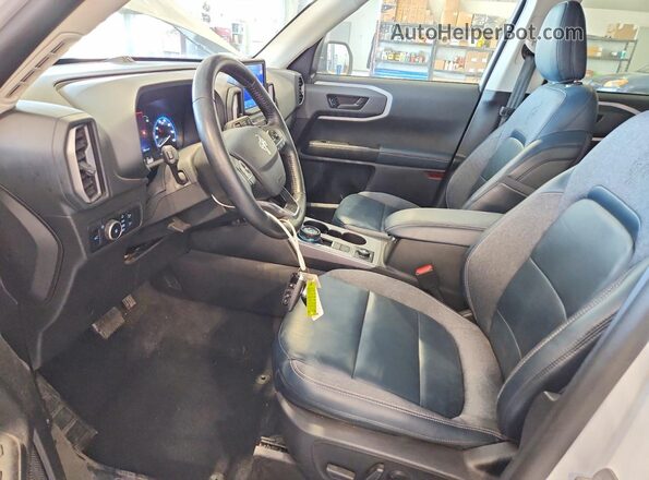 3FMCR9C69PRE07862 2023 FORD BRONCO Белый Вид салона спереди