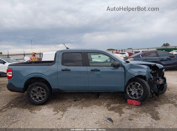 3FTTW8E95PRA20949 2023 FORD MAVERICK Blue Vista interior trasera