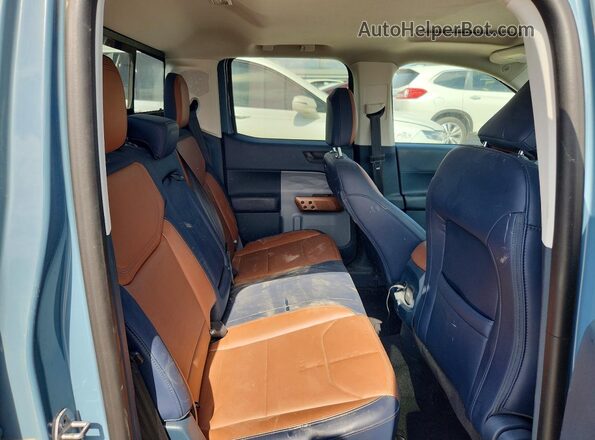 3FTTW8F98NRB05084 2022 FORD MAVERICK Blue Vista de los asientos traseros