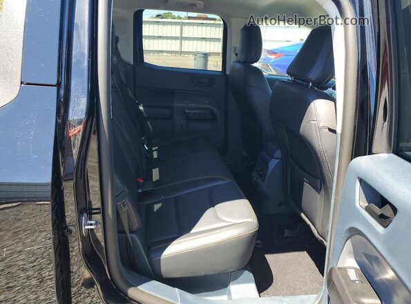 3FTTW8R94RRA72523 2024 FORD MAVERICK Black Rear interior view