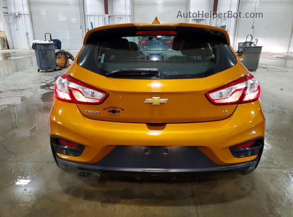 3G1BE6SM7HS575738 2017 CHEVROLET CRUZE Оранжевый Вид сзади