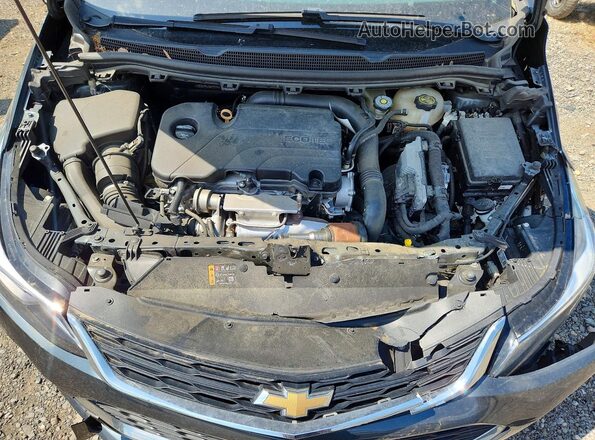3G1BE6SM9JS649974 2018 CHEVROLET CRUZE Charcoal Սալոնի հետևի տեսք