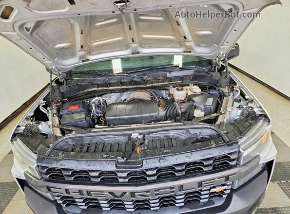 3GCNYAEF8LG180720 2020 CHEVROLET SILVERADO Серебряный Вид задней части салона
