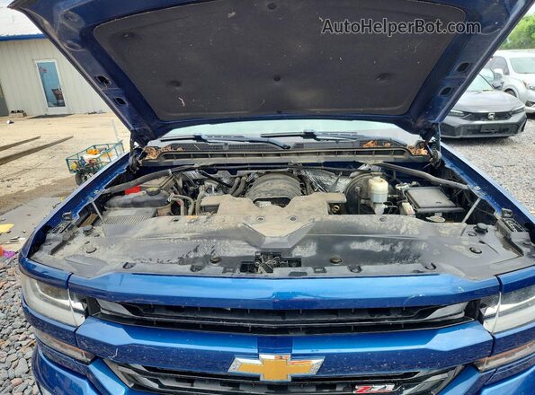 3GCUKREC7GG282632 2016 CHEVROLET SILVERADO Blue Rear interior view