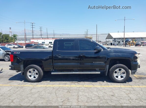 3GCUKREC7HG229088 2017 CHEVROLET SILVERADO Black Вид задньої частини салону