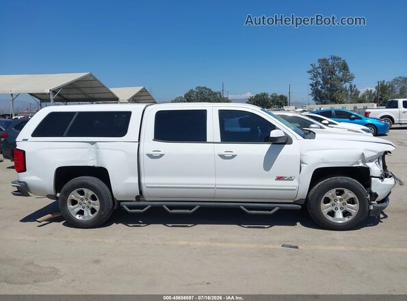 3GCUKREC7HG251947 2017 CHEVROLET SILVERADO White Вид задньої частини салону