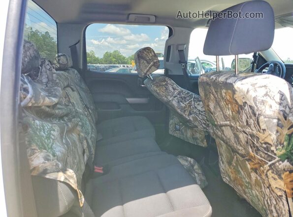 3GCUKREC8HG318409 2017 CHEVROLET SILVERADO White Vista de los asientos traseros