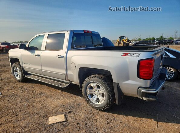 3GCUKREC9JG529060 2018 CHEVROLET SILVERADO Silver Tył lewy