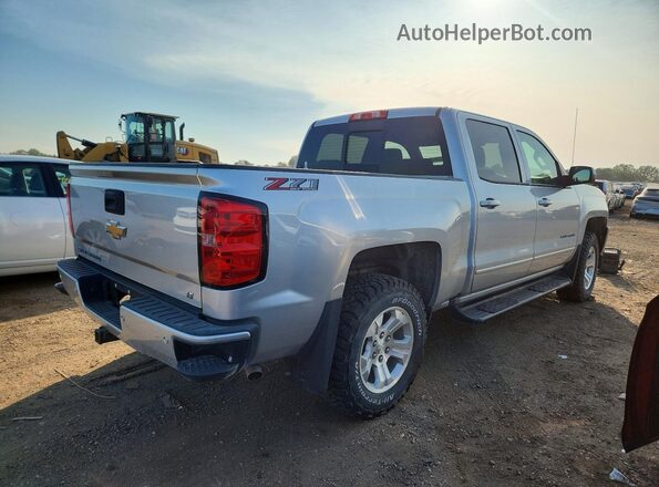 3GCUKREC9JG529060 2018 CHEVROLET SILVERADO Silver Tył prawy