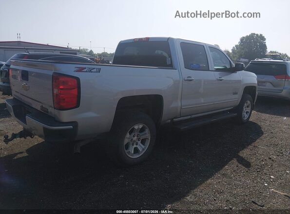 3GCUKREC9JG626727 2018 CHEVROLET SILVERADO Silver Trasero derecho
