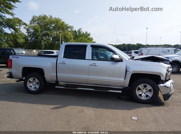 3GCUKREC9JG646203 2018 CHEVROLET SILVERADO Silver Widok wnętrza z tyłu