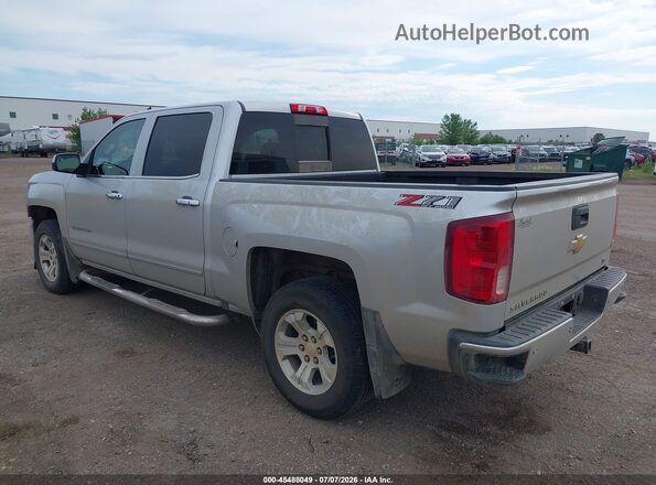 3GCUKSEC9JG366708 2018 CHEVROLET SILVERADO Silver Trasero izquierdo