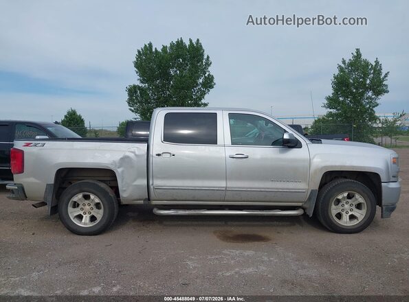 3GCUKSEC9JG366708 2018 CHEVROLET SILVERADO Silver Vista interior trasera