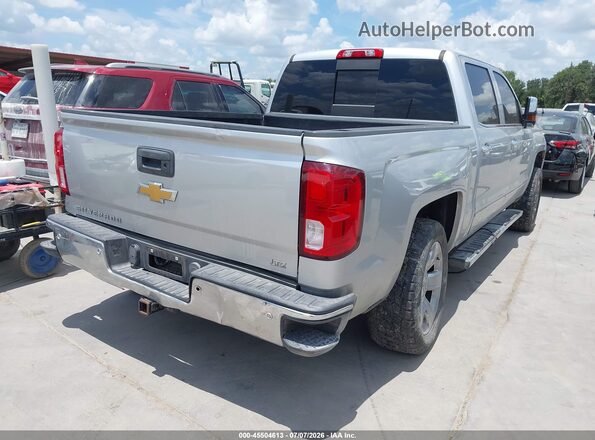 3GCUKSEJ8JG409823 2018 CHEVROLET SILVERADO Silver Trasero derecho