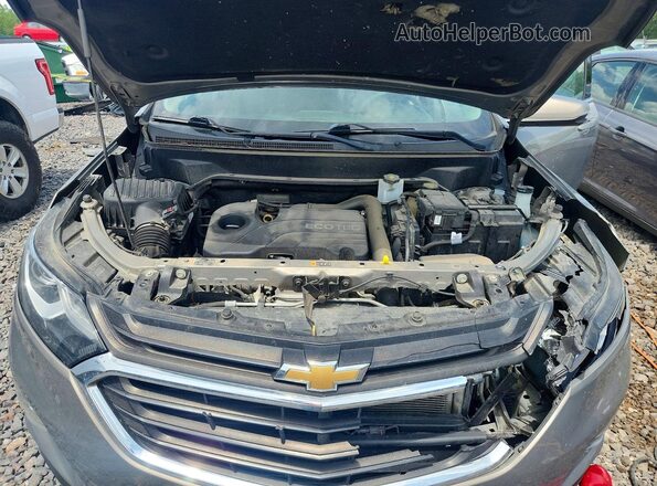 3GNAXJEV1JS606676 2018 CHEVROLET EQUINOX Gray Widok wnętrza z tyłu