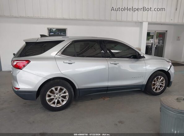 3GNAXJEV4JL102794 2018 CHEVROLET EQUINOX Silver Вид задньої частини салону