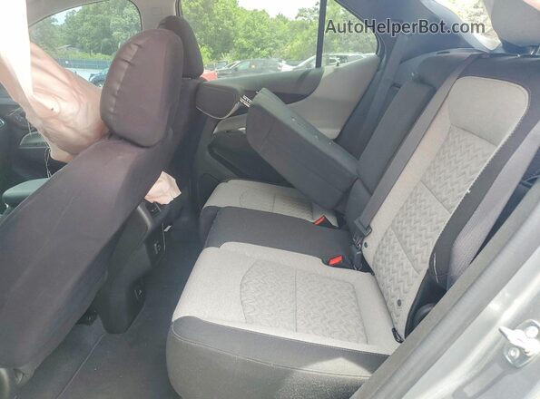 3GNAXKEG7RL216985 2024 CHEVROLET EQUINOX Silver Вид задньої частини салону