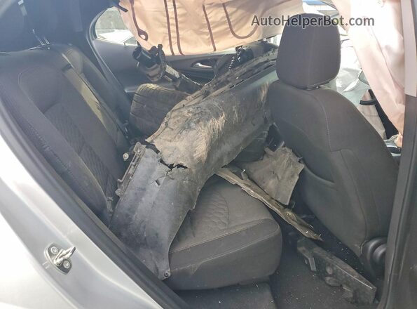 3GNAXSEV1JS618655 2018 CHEVROLET EQUINOX Silver Widok wnętrza z tyłu