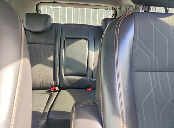 3GNCJLSB2JL408876 2018 CHEVROLET TRAX Red Rear seats view