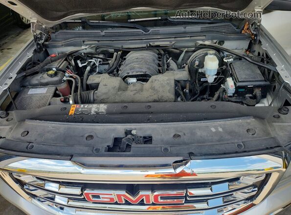 3GTU2NEC4JG501014 2018 GMC SIERRA Серебряный Вид задней части салона