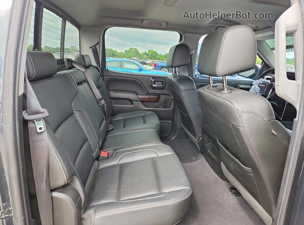 3GTU2NEC6JG550795 2018 GMC SIERRA Gray Vista de los asientos traseros