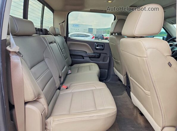 3GTU2PEJXGG160558 2016 GMC SIERRA Maroon Rear seats view