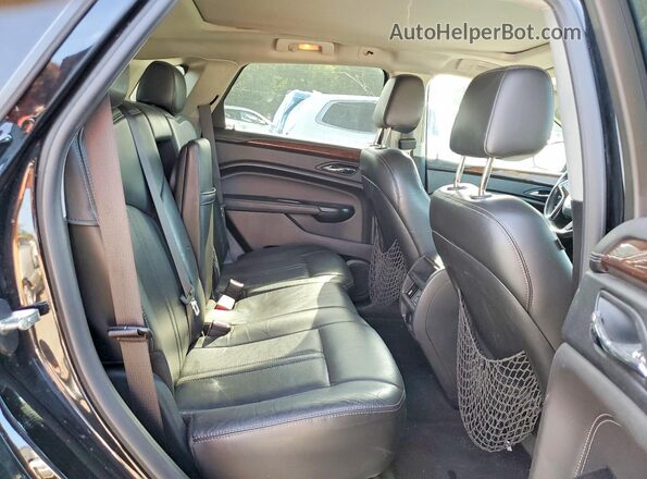 3GYFNBE30GS562164 2016 CADILLAC SRX Черный Вид задней части салона